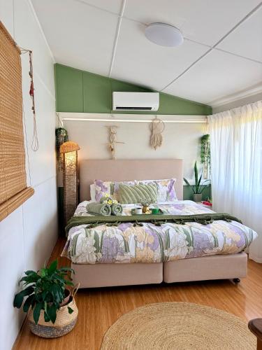 a bedroom with a bed in a room at Mystic Garden Private Entry & Bath, Pet Friendly in Wentworthville