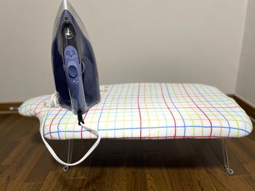a bag sitting on top of a bench at Maison du Skytree Tokyo in Tokyo