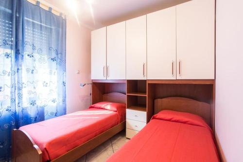 A bed or beds in a room at Annie's Home