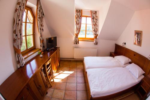 Postel nebo postele na pokoji v ubytování Hotel Kovac