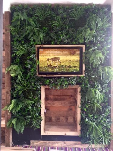 a wall with a picture of a horse on it at The Lodge Rooms in Coleford