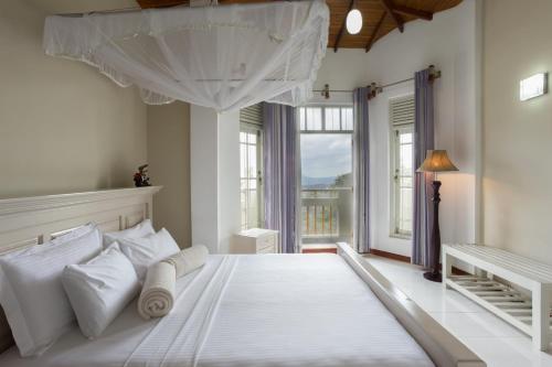 Cama ou camas em um quarto em Vista House Kandy