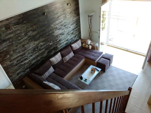 an overhead view of a living room with a couch at Apartments Morskoy Zakat in Zelenogradsk