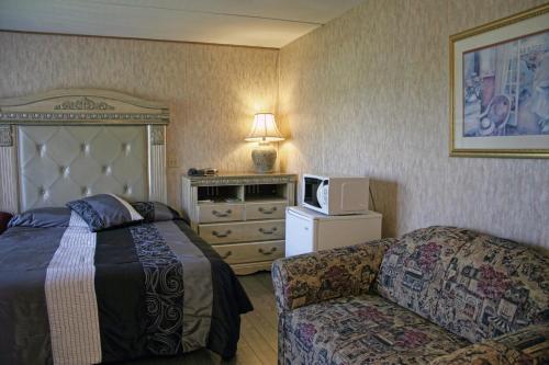 Postel nebo postele na pokoji v ubytování Motel Bellevue