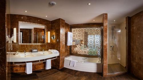 Phòng tắm tại Barceló Concorde Green Park Palace