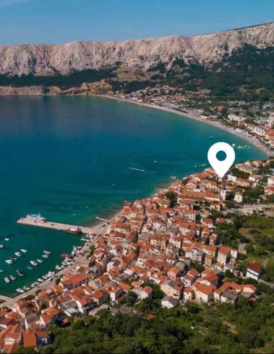 an aerial view of a town with a hot air balloon at Vacation home Dora in Baška