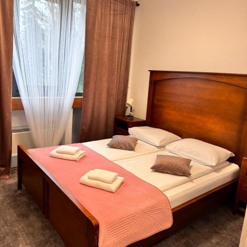 Krevet ili kreveti u jedinici u okviru objekta Hotel Paviljon