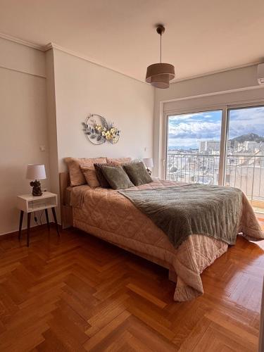 Posteľ alebo postele v izbe v ubytovaní Athens Sky Penthouse