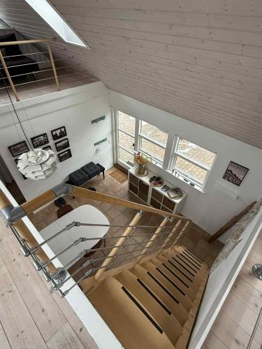 an overhead view of a living room with a bed at Guesthouse Villa Sønderklit in Skagen