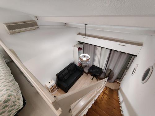 Un pat sau paturi într-o cameră la Studio Duplex