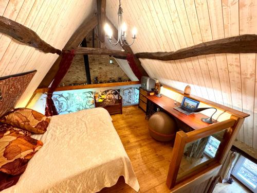 Llit o llits en una habitació de Gîtes Sibémol