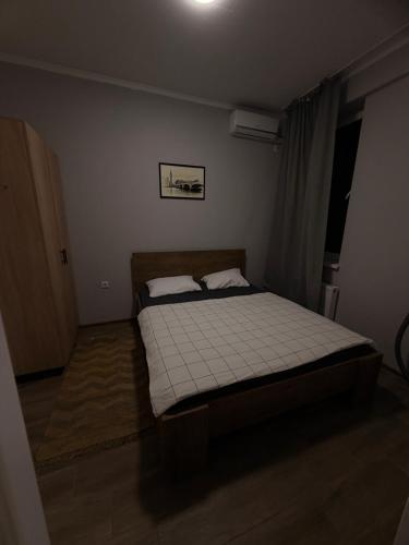 Krevet ili kreveti u jedinici u objektu Apartament în chirie
