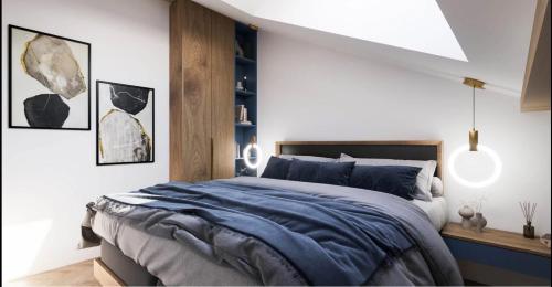 a bedroom with a bed with a blue blanket at WBR Apartlak in Villány