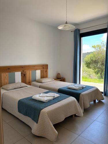 Ліжко або ліжка в номері Villa Giulia