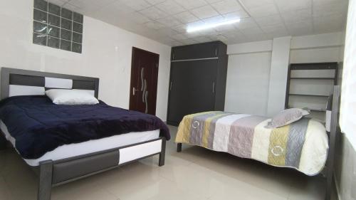 Llit o llits en una habitació de Deartamento de 80m2