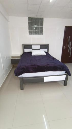 Llit o llits en una habitació de Deartamento de 80m2