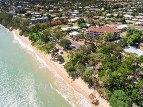 an aerial view of a beach with a resort at Charlton on The Esplanade in Hervey Bay