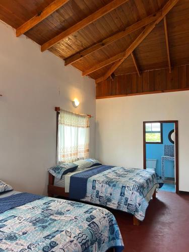 Llit o llits en una habitació de Cindiri