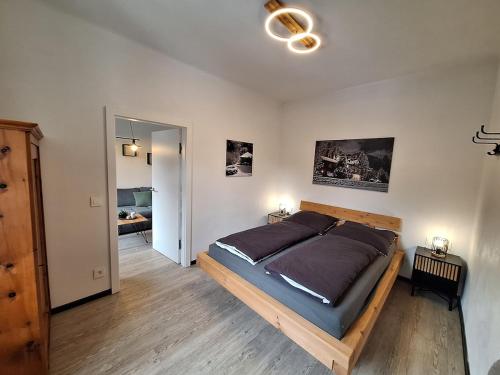En eller flere senge i et værelse på Ferienwohnung Ausblick mit Balkon im Ski- und Wandergebiet