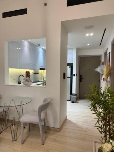 Кухня или кухненски бокс в The Residences