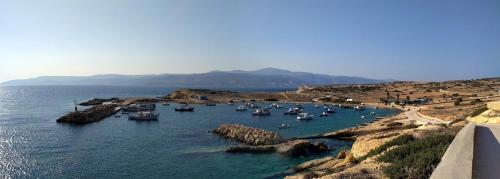 a group of boats in a body of water at Christina's House in Koufonisia