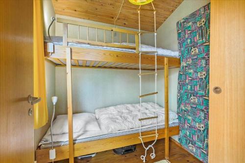 a bedroom with bunk beds in a room at 1055-Stege-Rylevej-21 in Stege