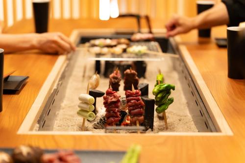a tray of food on a table with sushi at なか富士 -Nakafuji- in Fujinomiya