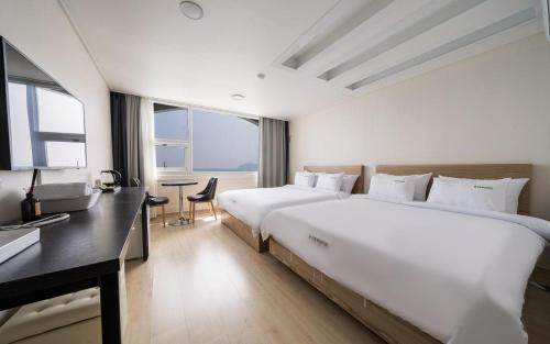 Katil atau katil-katil dalam bilik di VIEW Hotel Geoje