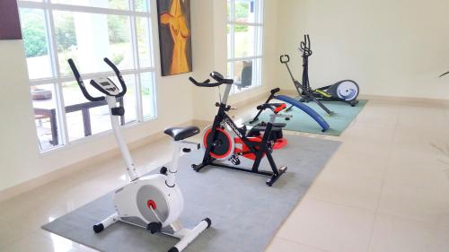 a gym with three exercise bikes in a room at 君洋飯店Co-Living Hotel 龍潭科學園區 楊梅湖口 月租旅居共生宅 in Yangmei
