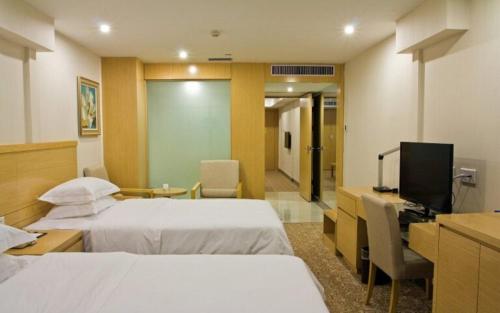 A room at Ramada Encore by Wyndham Wuhan Int'l Conference Center