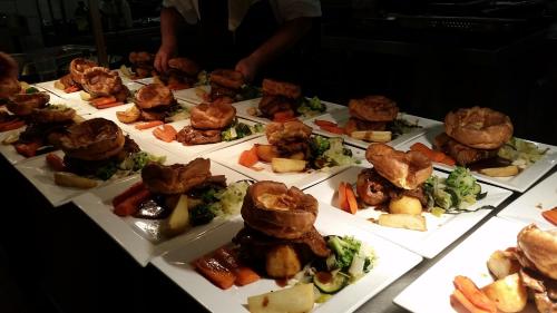 a group of plates of food on a table at The Green Man Stanford in Southill