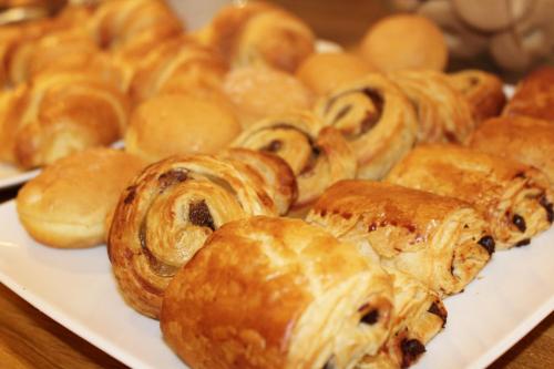 a plate of pastries on top of a table at Best Western Hotel Piemontese in Bergamo