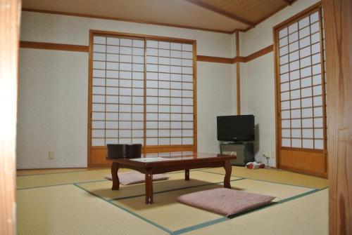 Predel za sedenje v nastanitvi Shinazawa