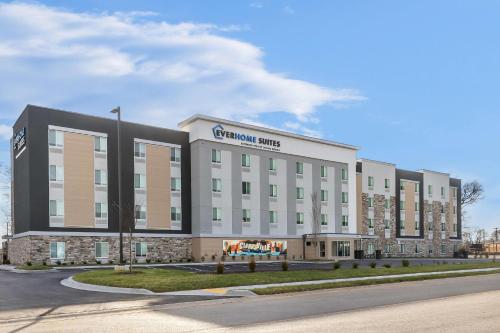 a large white building with a sign on it at Everhome Suites Clarksville Ft Campbell Area by Choice Hotels in Clarksville