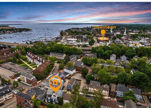 an aerial view of a town with a yellow balloon at Steps to Downtown Rooftop Deck Flexible Temp Stay in Newburyport