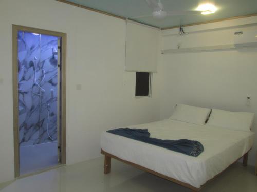 เตียงในห้องที่ Gk Eleven