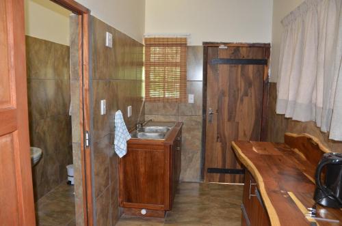 Kuhinja oz. manjša kuhinja v nastanitvi Stoep At Steenbok Self Catering