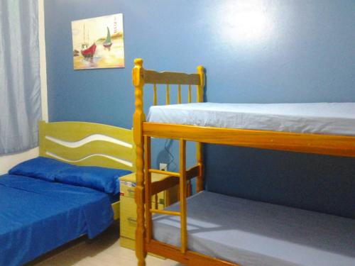 Katil atau katil-katil dalam bilik di Residencial Ostras