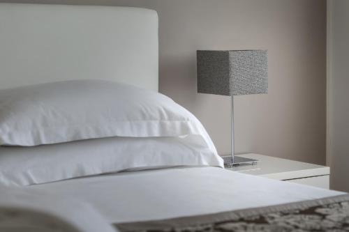 Postel nebo postele na pokoji v ubytování Hotel Abner's
