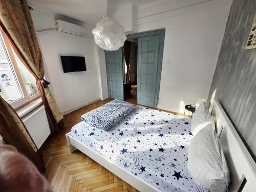 Llit o llits en una habitació de StayInn