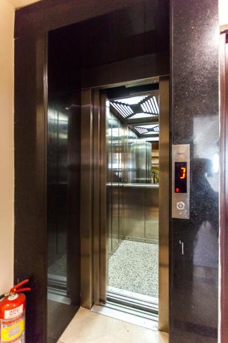 an entrance to a building with a revolving door at Pera Life in Istanbul
