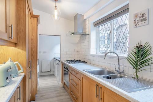 a kitchen with a sink and a window at 2 Bed in Hunningham oc-h34740 in Bubbenhall