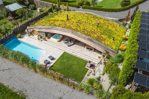 an overhead view of a house with a swimming pool at Pagórek w Brennej in Brenna