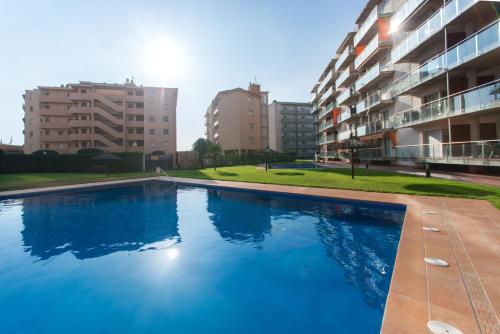 WELCS APARTAMENTO 312 EMP con piscina y parking privado