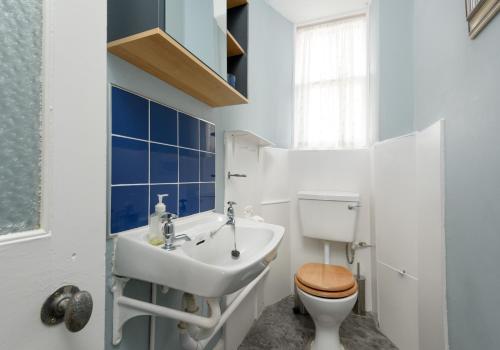 a bathroom with a sink and a toilet at Sandy Neuk in North Berwick
