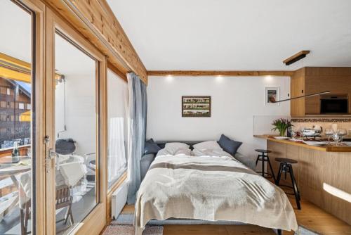 Central flat in Villars sur Ollon, Amethyste, for 4, with two double beds, balcony and 75m to ski-train
