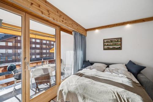 Central flat in Villars sur Ollon, Amethyste, for 4, with two double beds, balcony and 75m to ski-train