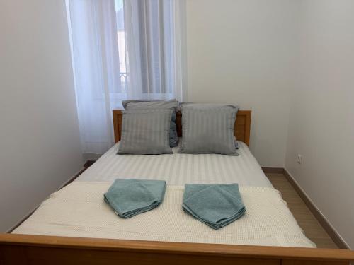 Llit o llits en una habitació de L'Appart Chaleur