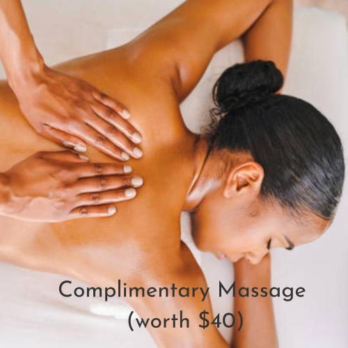 a woman with her hands on her back at The Nest - Complimentary Massage Included in Kigali