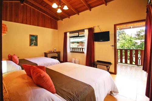 Ένα δωμάτιο στο Monteverde Country Lodge - Costa Rica